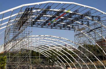 metal structure with bars and seats for events