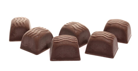 Orange liqueur flavored chocolates isolated on white background 