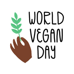 World vegan day banner with hand lettering. Vegetarian, vegan food symbol. A hand holds a green plant branch, leaf