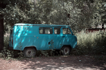 Retro transport recycling scrap metal, utilization, vintage old rusty car uaz abandoned destroyed...