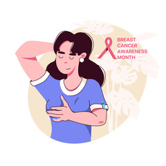 Young woman palpates her breasts, breast cancer self-diagnosis. Breast Cancer Awareness Month.