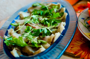 Chopped salted herring with chopped green parsley.
