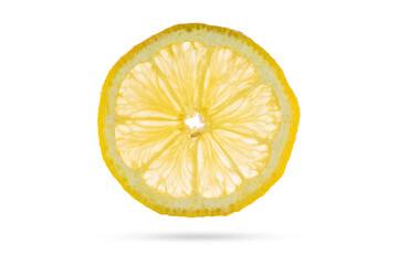 Translucent lemon slice isolated on white background