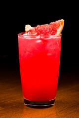 Grapefruit cocktail in tall glasses with ice and sparkling water