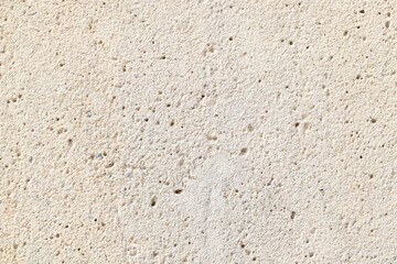 Cemented background, wall, light color element, copy space.
