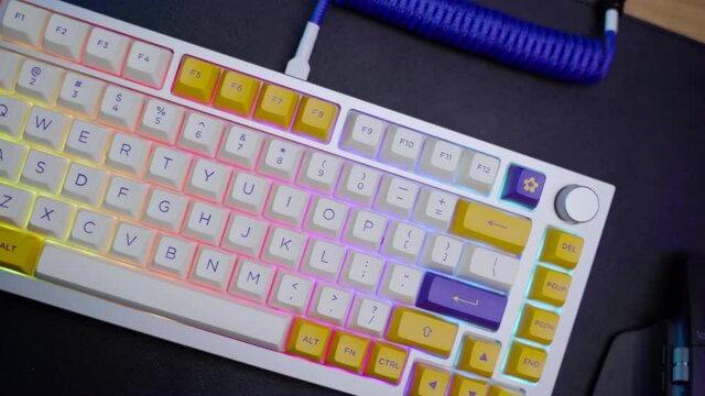 footage of a premium custom keyboard build kit with full alluminium base and bright RGB LED Colors