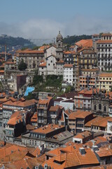 Fototapeta na wymiar View on the roofs of Porto from the top of the cathedral