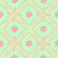 ethnic pattern with geometric seamless flower in green background for fabric with spring pastel color