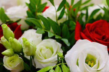 Selective focus. Bouquet of roses white red. Congratulations on the holiday.