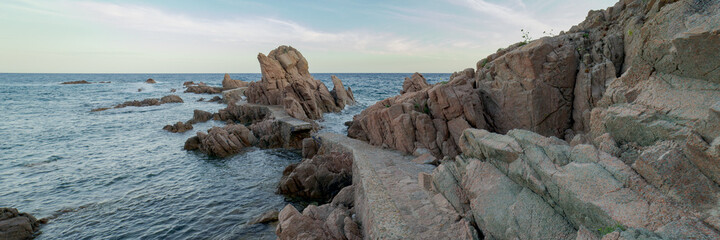 Panoramic view of the runway known as the bridges way in Canyet Creek between rocks and the mediterranean sea