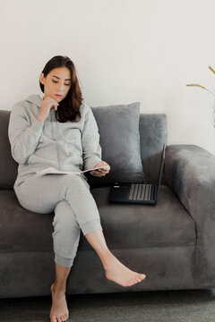 woman reading in home and working 