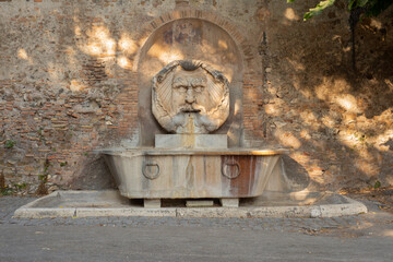 Front view of the Fontana del Mascherone di Santa Sabina near the orange garden Rome Italy