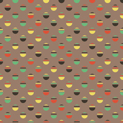 Seamless background with circles of different colors. Fragmented circles in staggered order.