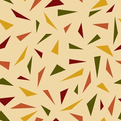 Abstract seamless vector pattern with triangles in green yellow and red color