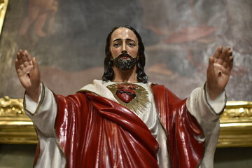 Wizerunek Pana Jezusa na tle obrazu religijnego - obrazy, fototapety, plakaty