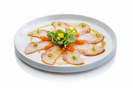 Freshi Kanpachi Carpaccio on white background