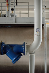 Industrial water treatment and boiler room. Pipes, piping, levers, barometers, connections....
