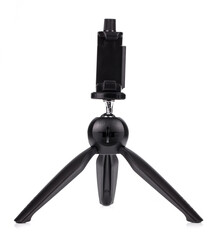 Mini clamp tripod for smartphones cameras isolated on a white background.