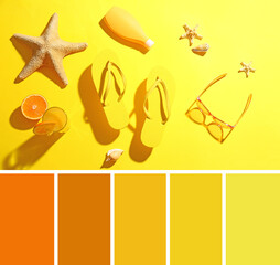 Composition with beach accessories and glass of juice on yellow background. Different color patterns