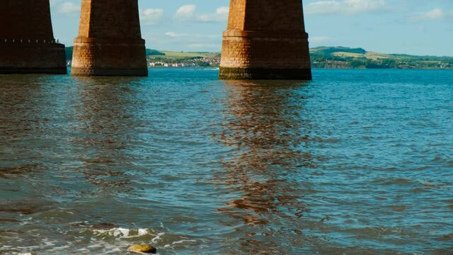 Close-up view of the Firth of Forth in Scotland, UK, featuring the Forth Railway Bridge, an amazing feat of Victorian engineering