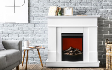 Modern fireplace in interior of stylish living room