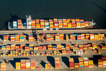 Aerial top view of business logistic import and export freight transportation by container ship in...