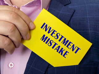 Business concept meaning INVESTMENT MISTAKE with inscription on the sheet.