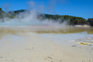 Geothermal Landscape with hot boiling mud and sulphur springs due to volcanic activity in Wai-O-Tapu, Thermal Wonderland New Zealand