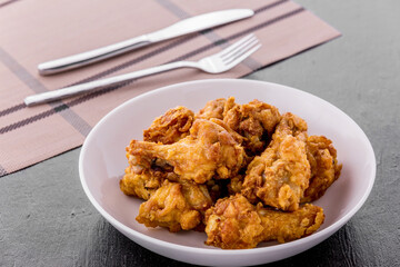 Fried chicken on dark background