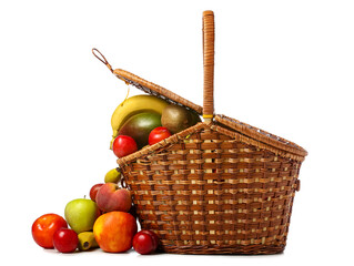 Basket with fresh fruits on white background
