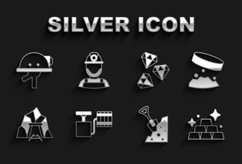 Set Handle detonator, Giant magnet holding iron dust, Gold bars, Shovel stone, Mine entrance, Gem, Miner helmet and icon. Vector