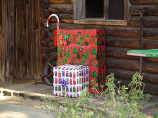 Christmas presents at a log cabin