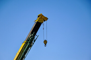 Fototapeta na wymiar yellow crane hook