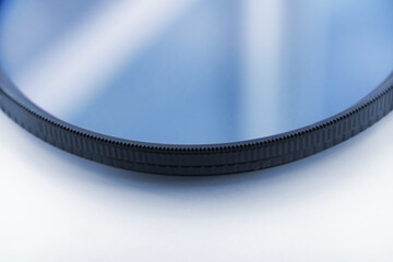 cpl polarization filter for photo video cameras on white background