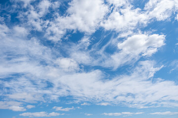 Beautiful fluffy cumulus clouds in the blue sky. Perfect background of blue sky and white clouds...