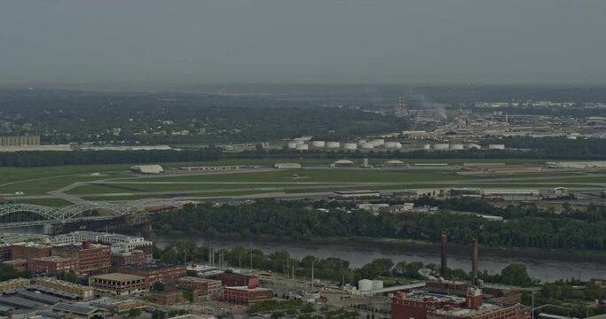 Kansas Missouri Aerial V18 Circular Pan From Charles B. Wheeler Downtown Airport Reveals Urban Cityscape With High Rise Buildings Across The River - Shot With Inspire 2, X7 Camera - August 2020