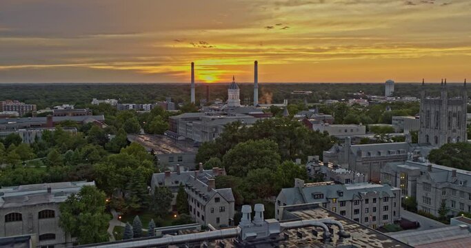 Columbia Missouri Aerial v6 panoramic dolly in shot, drone flying low toward beautiful golden sunset through mizzou university college campus - Shot with Inspire 2, X7 camera - August 2020