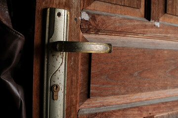 door handle to open door with wooden door
