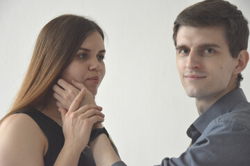 Hansome man touching face of wife