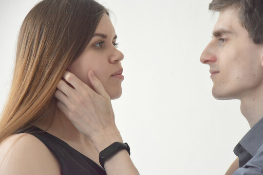 Hansome man touching face of wife