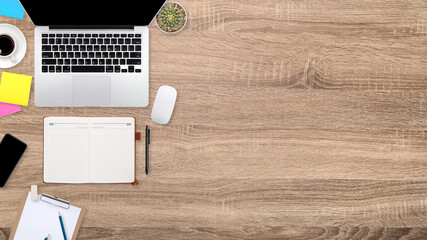 flat lay workspace table with laptop computer, office supplies, coffee cup, tablet and cell phone on wooden background