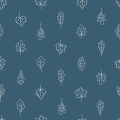 Autumn foliage seamless pattern. A pattern of small contoured oak and maple leaves on a dark background. Vector illustration. 