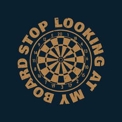 t shirt design stop looking at my board with dartboard and dark blue background vintage illustration