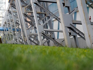 Concrete structures symbolizing the future on a green natural lawn.