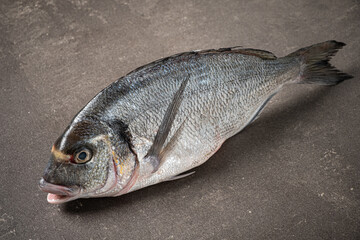 raw fish on the stone