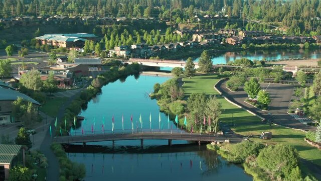 Aerial: Bridge crossing the Deschutes River in the Old Mill District, Bend, Oregon, USA