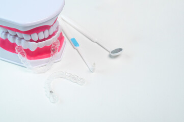 Invisalign braces and tools for dental care, dental healthcare and Orthodontic concept.