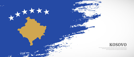 National flag of Kosovo with textured brush flag. Artistic hand drawn brush flag banner background