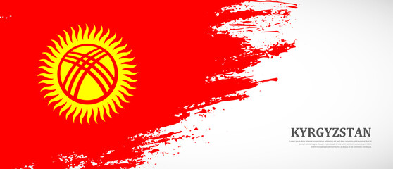National flag of Kyrgyzstan with textured brush flag. Artistic hand drawn brush flag banner background