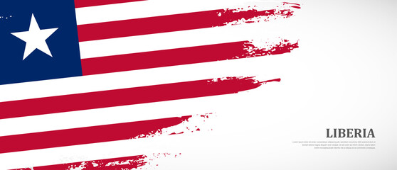 National flag of Liberia with textured brush flag. Artistic hand drawn brush flag banner background
